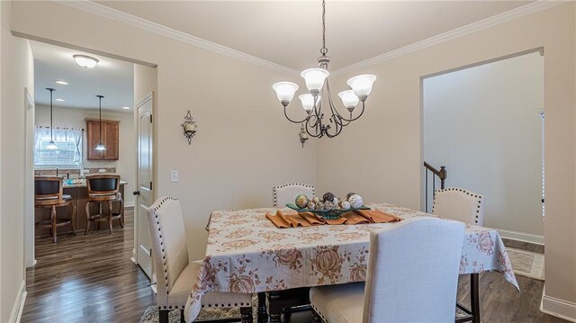 879 Tranquil Way, Hampton, GA 30228 - dining room featuring dark wood-style flooring, a chandelier, and ornamental molding
