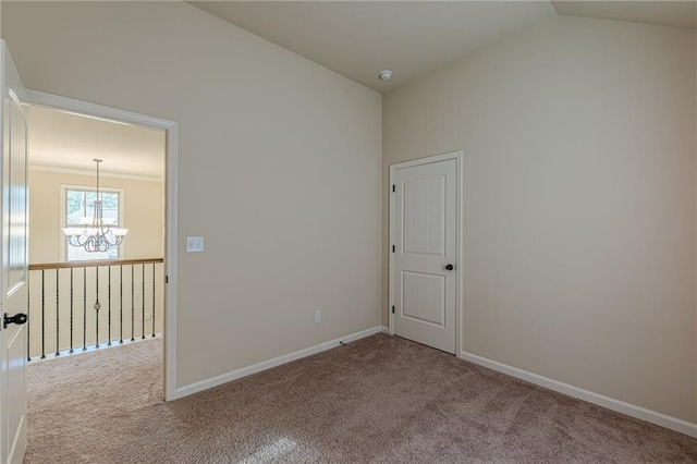 879 Tranquil Way, Hampton, GA 30228 - carpeted spare room featuring a chandelier and vaulted ceiling