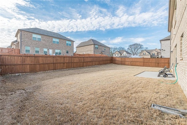 879 Tranquil Way, Hampton, GA 30228 - fenced backyard featuring a patio area and a residential view