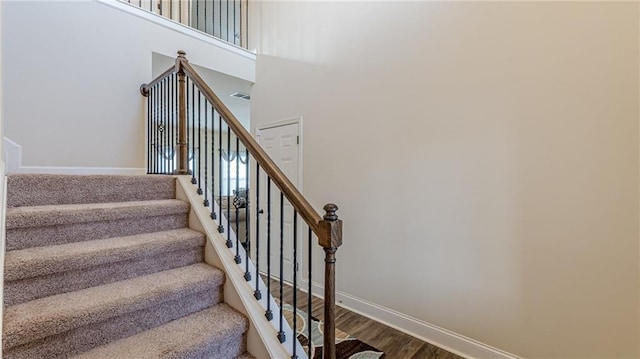 879 Tranquil Way, Hampton, GA 30228 - staircase featuring wood finished floors and baseboards