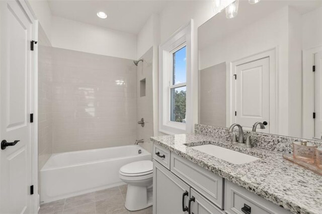 laundry room featuring sink, cabinets, electric dryer hookup, hookup for a washing machine, and light tile patterned floors