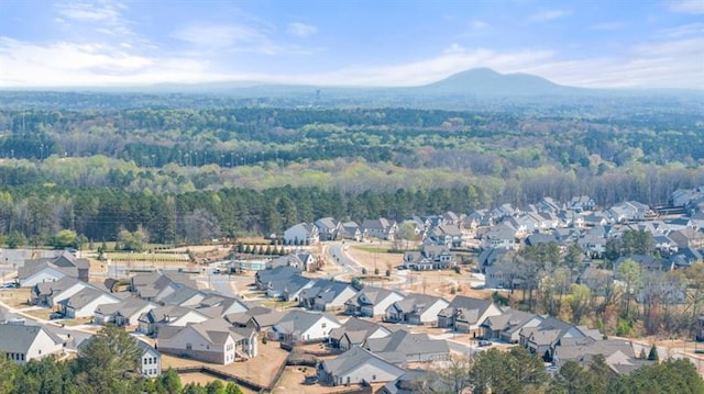 birds eye view of property featuring a mountain view