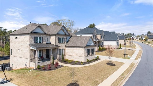 view of front facade featuring a front yard