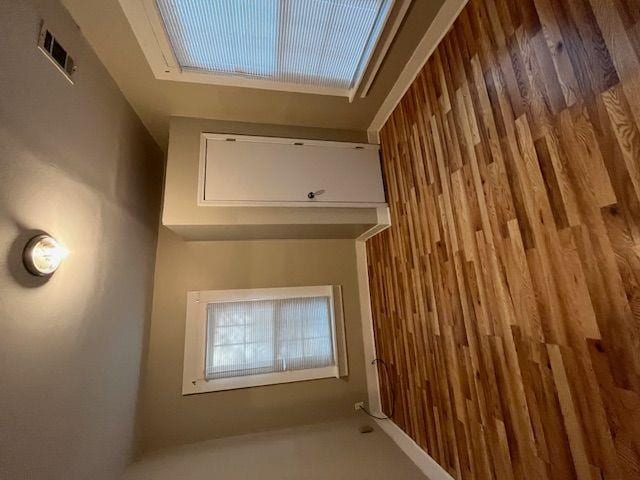 bonus room with wood walls