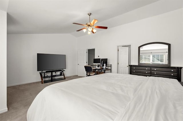 bedroom with carpet flooring, vaulted ceiling, and ceiling fan