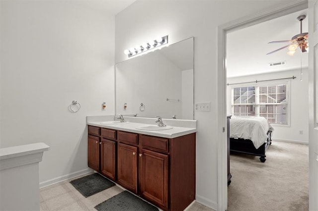 bathroom featuring ceiling fan and vanity