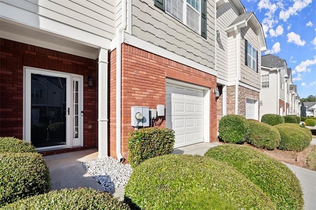 entrance to property featuring a garage