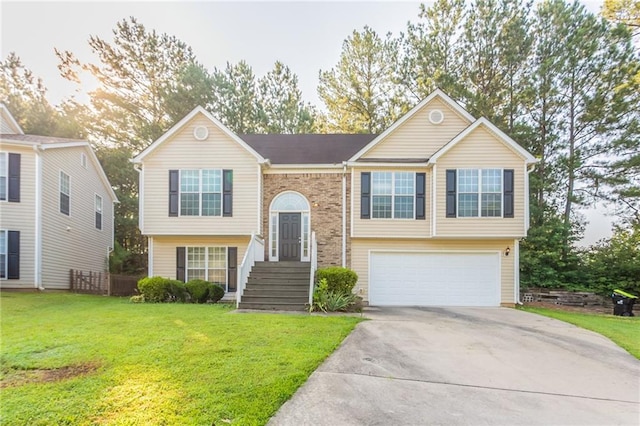 5033 Kens Ct, Stockbridge, GA 30281 - bi-level home with an attached garage, driveway, and a front yard