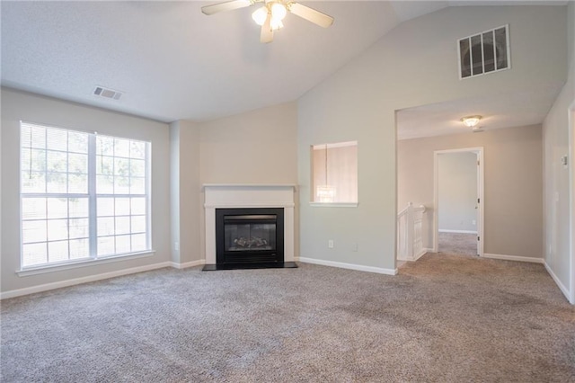 5033 Kens Ct, Stockbridge, GA 30281 - unfurnished living room featuring carpet flooring, ceiling fan, high vaulted ceiling, and a fireplace with flush hearth