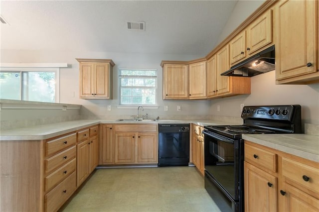 5033 Kens Ct, Stockbridge, GA 30281 - kitchen with black appliances, under cabinet range hood, light brown cabinets, light countertops, and a peninsula
