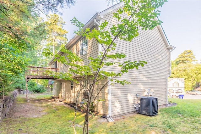 5033 Kens Ct, Stockbridge, GA 30281 - view of home's exterior featuring a deck and a lawn