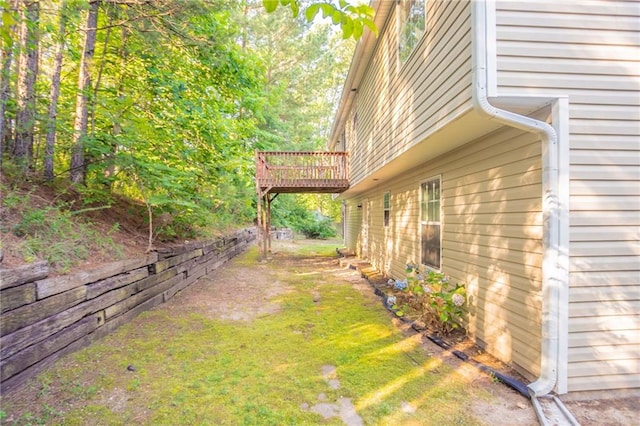5033 Kens Ct, Stockbridge, GA 30281 - view of grassy yard featuring a wooden deck