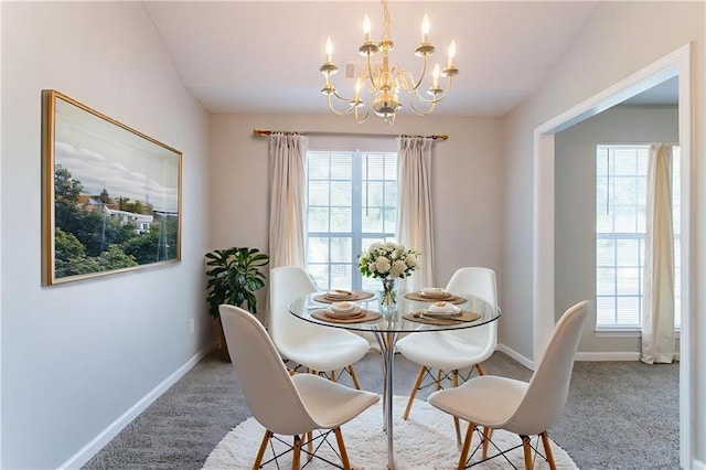 5033 Kens Ct, Stockbridge, GA 30281 - carpeted dining space featuring a chandelier and baseboards