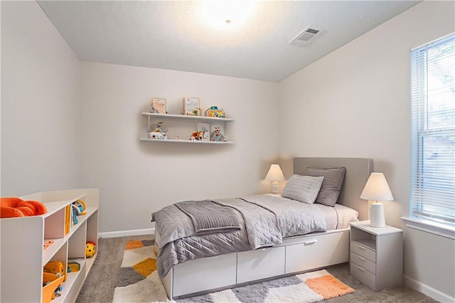 5033 Kens Ct, Stockbridge, GA 30281 - bedroom featuring carpet floors and baseboards