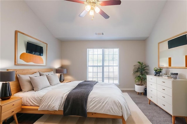 5033 Kens Ct, Stockbridge, GA 30281 - bedroom featuring lofted ceiling, ceiling fan, and light colored carpet
