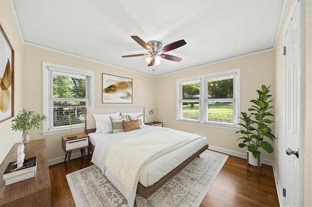 2100 Shady Ln, Tucker, GA 30084 - bedroom featuring multiple windows, baseboards, and wood finished floors