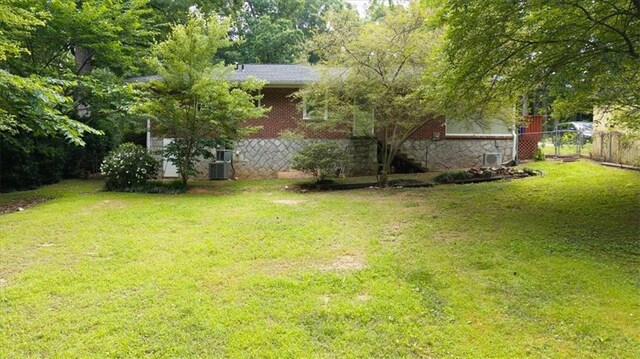 2100 Shady Ln, Tucker, GA 30084 - view of yard with central AC unit