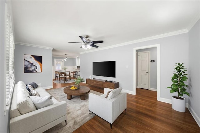 2100 Shady Ln, Tucker, GA 30084 - living room with crown molding, wood finished floors, a ceiling fan, and baseboards