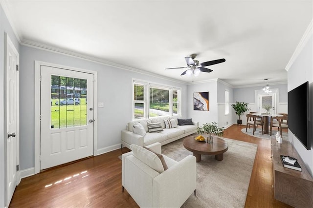 2100 Shady Ln, Tucker, GA 30084 - living area with wood finished floors, healthy amount of natural light, crown molding, and ceiling fan