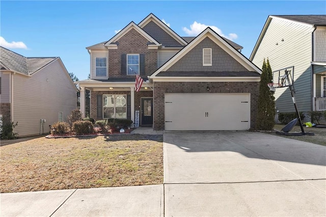 view of front facade featuring a front yard and a garage