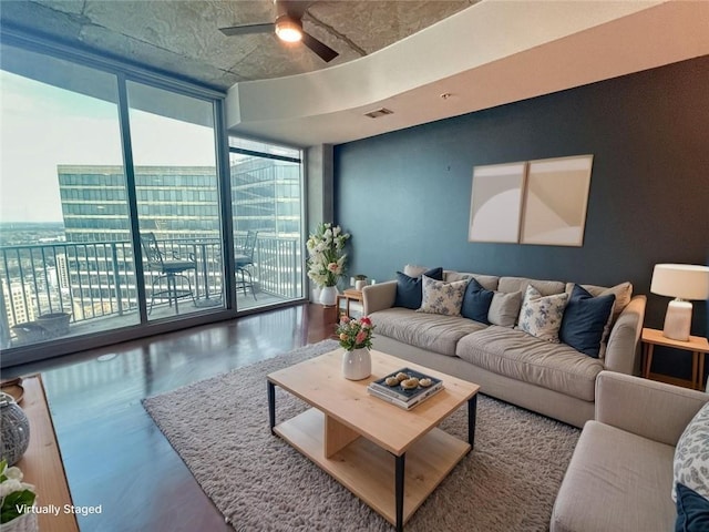 400 W Peachtree St NW Unit 3216, Atlanta, GA 30308 - living room featuring floor to ceiling windows, wood finished floors, and a ceiling fan