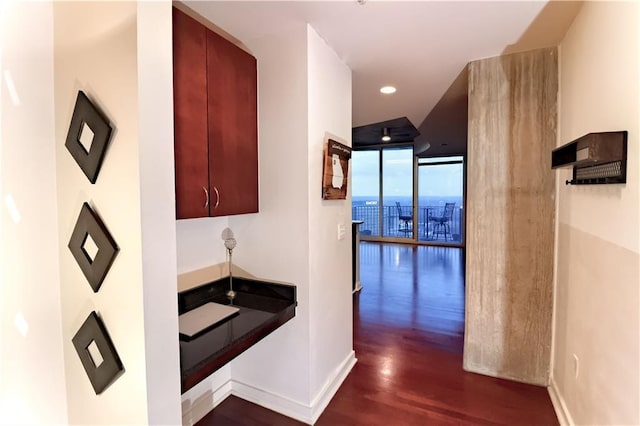 400 W Peachtree St NW Unit 3216, Atlanta, GA 30308 - hallway with dark wood-style flooring and floor to ceiling windows