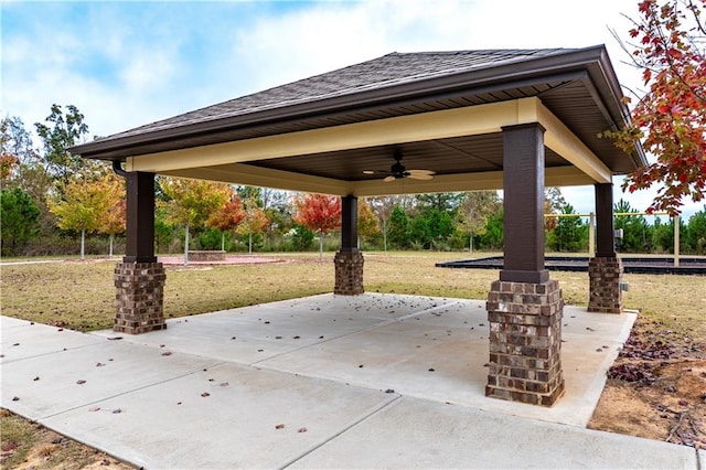 view of patio with ceiling fan and a gazebo