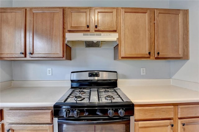 kitchen featuring black gas range oven