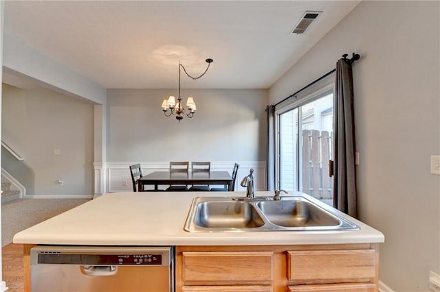 kitchen featuring sink, dishwasher, a chandelier, and light brown cabinets