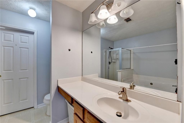 bathroom featuring a textured ceiling, tile patterned flooring, toilet, an enclosed shower, and vanity