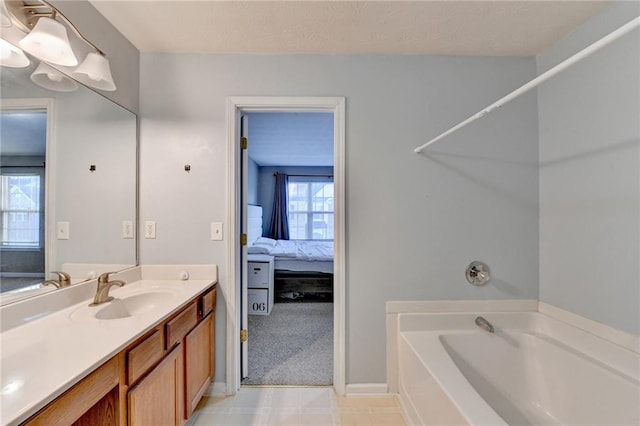 bathroom with a bathtub and vanity