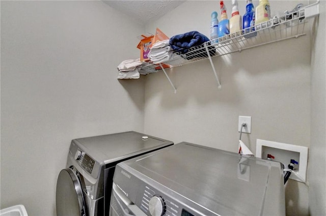 laundry area featuring separate washer and dryer