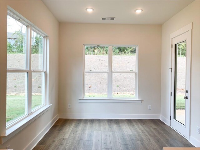 interior space with dark hardwood / wood-style flooring