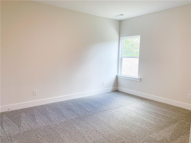 view of carpeted spare room