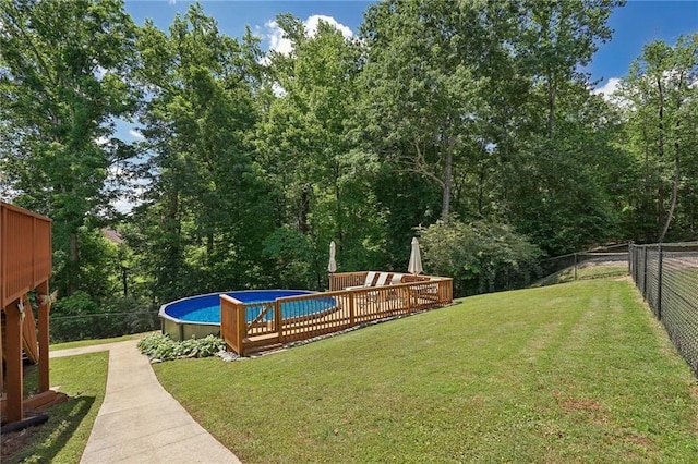 view of yard with an outdoor pool