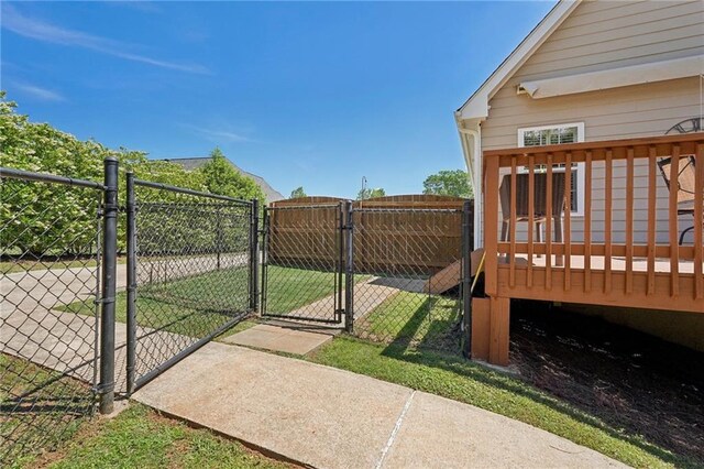 gate with a deck and fence