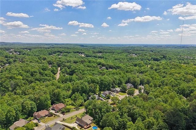 drone / aerial view of a heavily wooded area