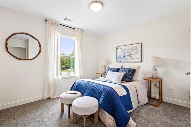 carpeted bedroom featuring baseboards