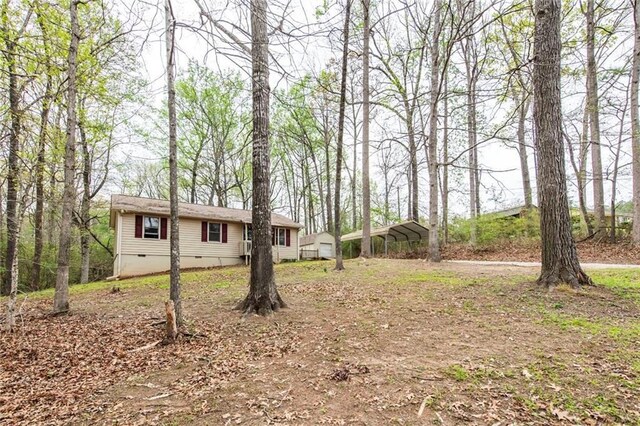 57 George Byrom Rd, Newnan, GA 30263 - view of yard featuring a carport