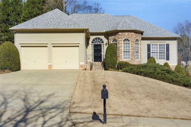 ranch-style home featuring a garage