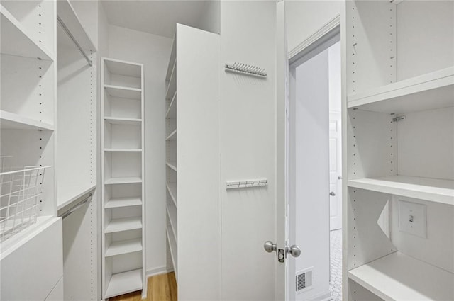 bathroom featuring walk in shower