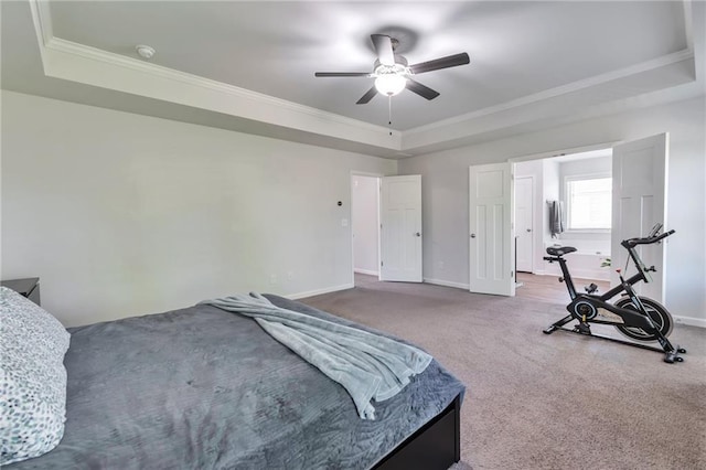 2021 Adam Acres Dr, Lawrenceville, GA 30043 - carpeted bedroom with a tray ceiling, crown molding, ceiling fan, and baseboards