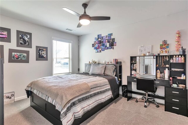 2021 Adam Acres Dr, Lawrenceville, GA 30043 - carpeted bedroom with visible vents, baseboards, and a ceiling fan
