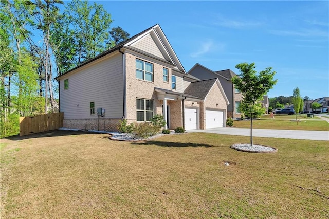 2021 Adam Acres Dr, Lawrenceville, GA 30043 - view of front facade featuring a garage, brick siding, driveway, and a front lawn