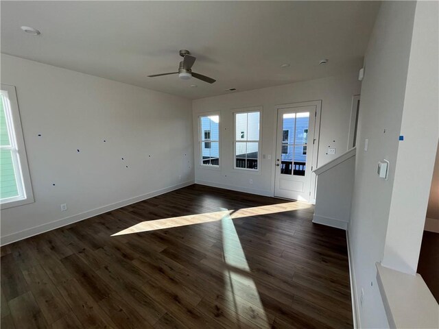 interior space featuring french doors, a towering ceiling, light hardwood / wood-style flooring, and an inviting chandelier