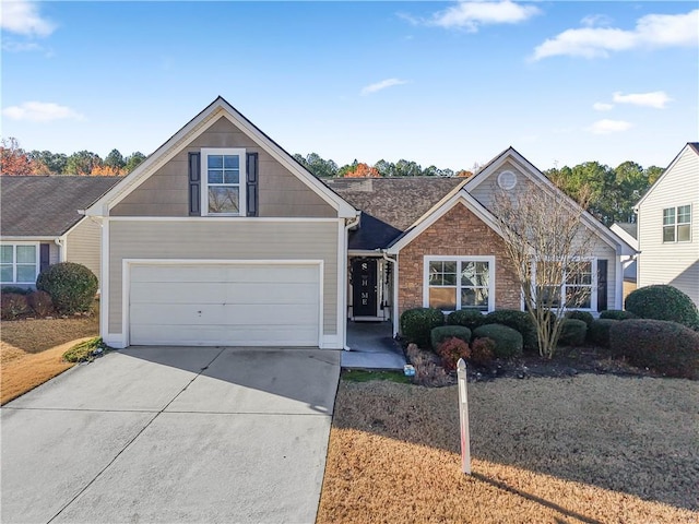 view of front of property with a garage