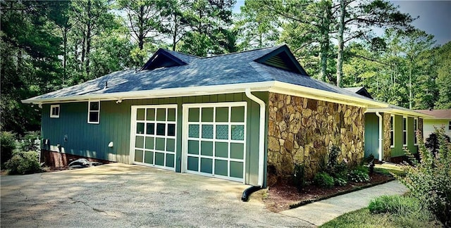 1516 Chase Ct, Riverdale, GA 30296 - view of property exterior with stone siding and driveway