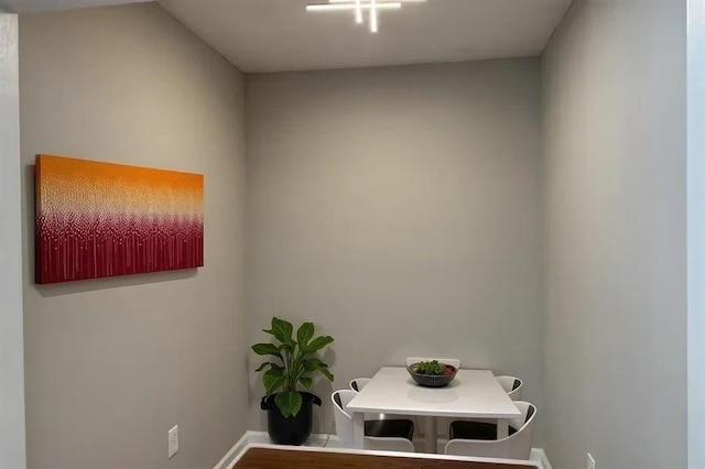 1516 Chase Ct, Riverdale, GA 30296 - washroom featuring baseboards and wood finished floors