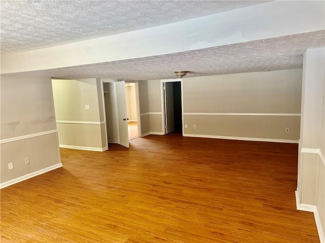 1516 Chase Ct, Riverdale, GA 30296 - unfurnished room featuring wood finished floors and a textured ceiling
