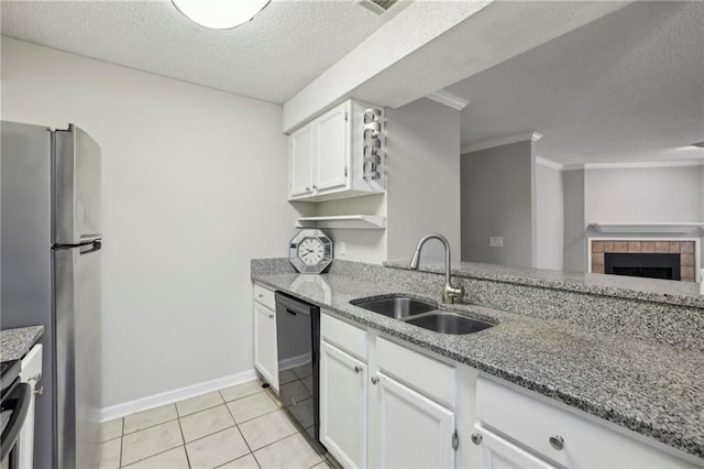 511 Barrington Hills Dr, Atlanta, GA 30350 - kitchen featuring freestanding refrigerator, a textured ceiling, light stone countertops, white cabinets, and black dishwasher